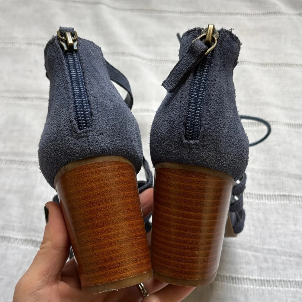 Aubrey Lynn blue suede gladiator-style heels with a tie and zip closure